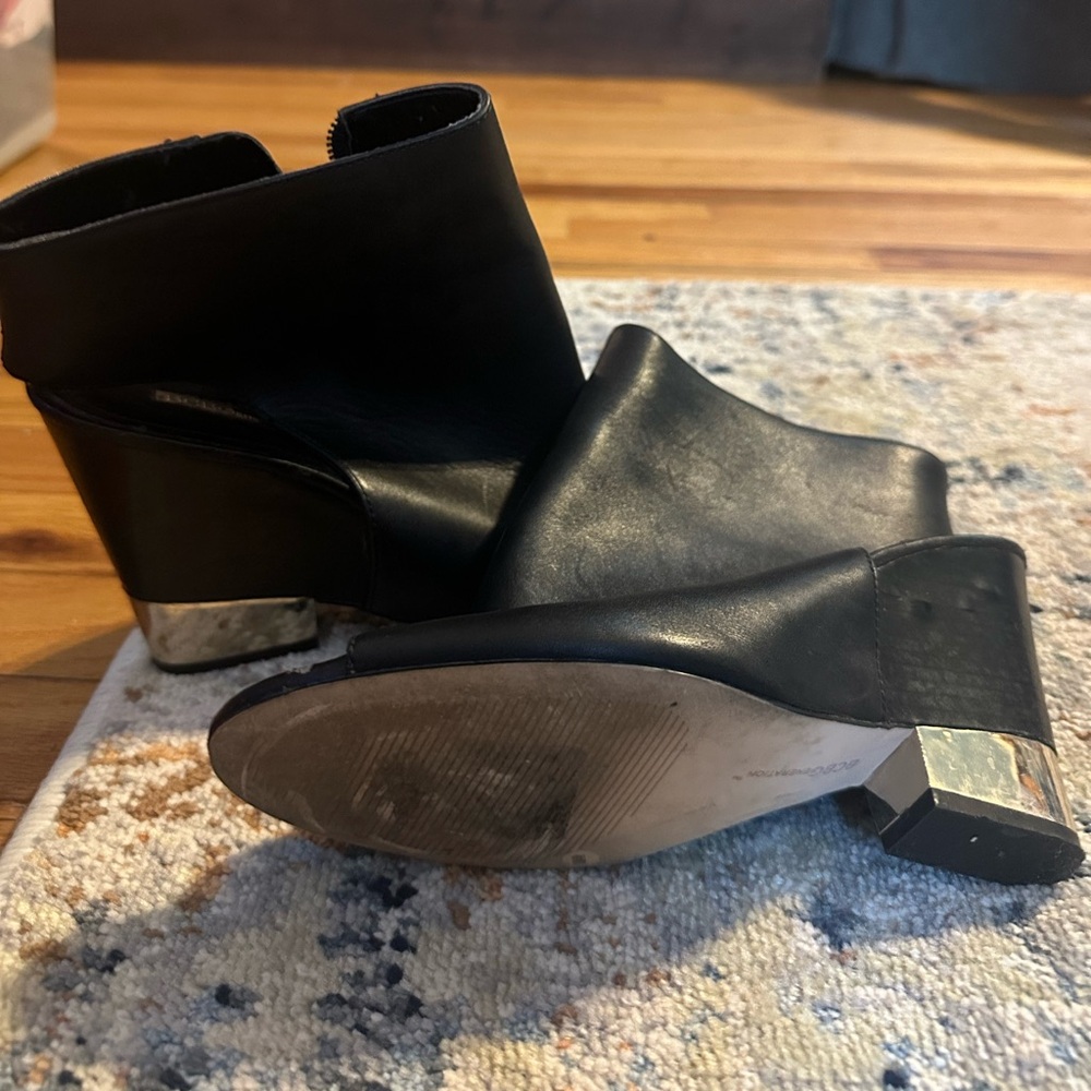 BCBGeneration Black Wedge Boots with Silver Accents